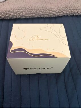 Phomemo Thermal Label Printer Box - White with Purple & Gold Accents